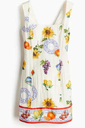 H&M Rusettikoristeinen mekko
