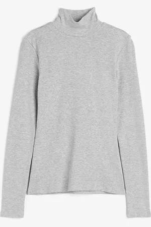 H&M Ribattu poolopusero