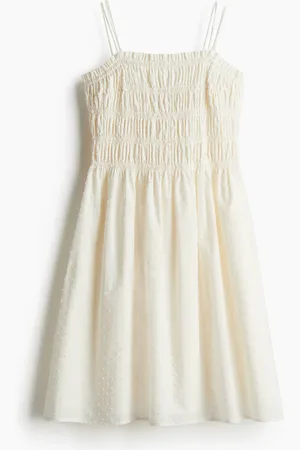 H&M Yläosasta smokkirypytetty puuvillamekko
