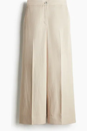 H&M Huolitellut väljät housut