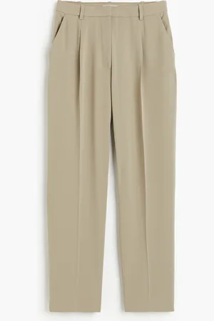 H&M Väljät prässilahkeiset housut