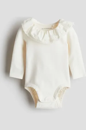 H&M Röyhelökauluksinen body