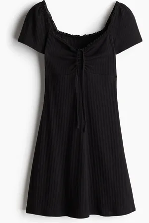 H&M Alaosasta levenevä pitsireunainen mekko