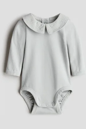 H&M Musliinikauluksinen puuvillabody