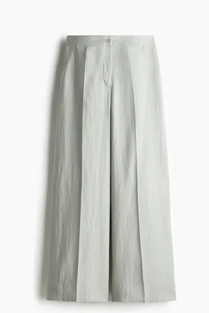 H&M Huolitellut väljät housut