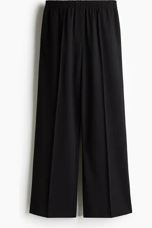 H&M Väljät prässilahkeiset housut
