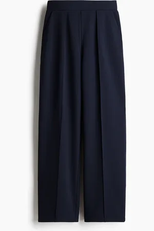 H&M Huolitellut korkeavyötäröiset housut