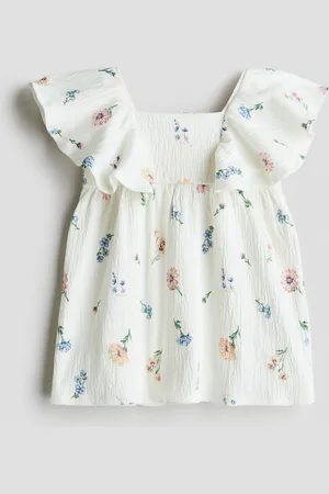 H&M Röyhelösomisteinen mekko