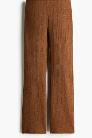 H&M Levenevät rypytetyt housut