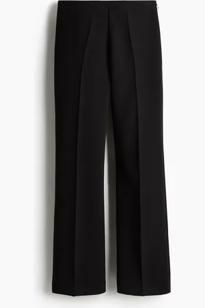 H&M Levenevät prässilahkeiset housut