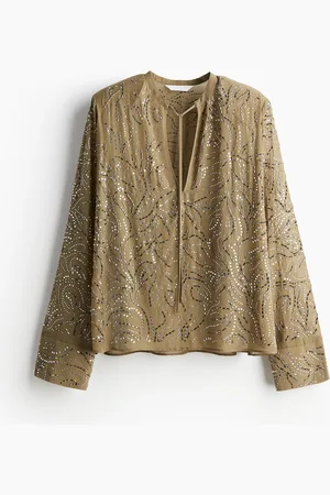H&M Strassikoristeinen pusero