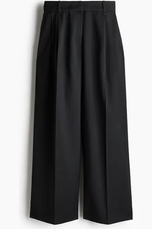 H&M Huolitellut väljät housut