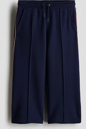 H&M Väljät prässilahkeiset housut