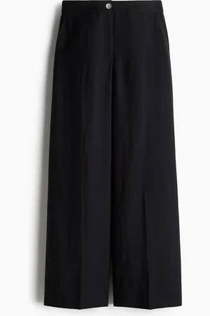 H&M Huolitellut väljät housut