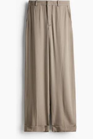 H&M Huolitellut taitelahkeiset housut