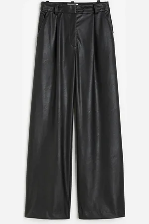 H&M Väljät pinnoitetut housut