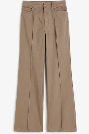 H&M Levenevät prässilahkeiset tvillihousut