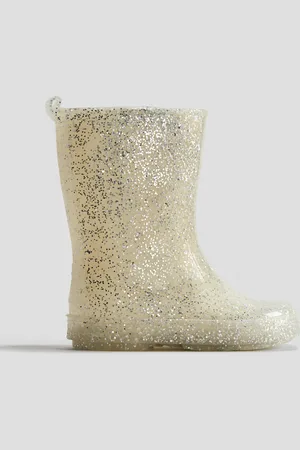 H&M Kimaltavat kumisaappaat