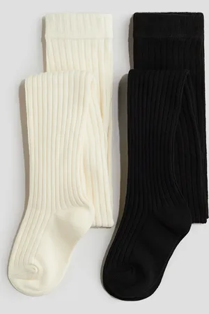 H&M 2 kpl ohuita neulesukkahousuja