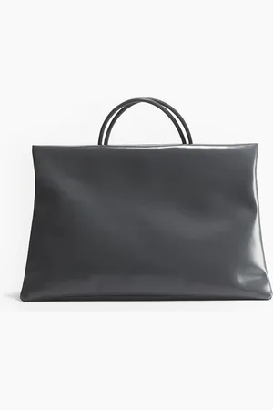 H&M Iso pehmustettu laukku