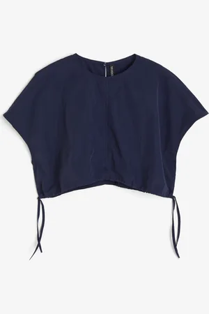 H&M Lyhyt nyörillinen pusero