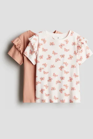 H&M 2 kpl röyhelöreunaisia puuvillapuseroita