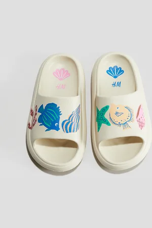H&M Vankat painokuvalliset rantasandaalit