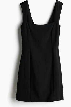 H&M Rusettikoristeinen mekko