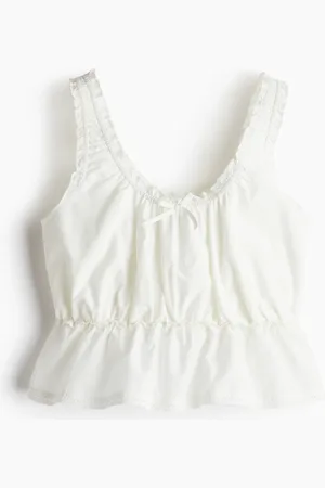 H&M Rypytetty peplum-toppi