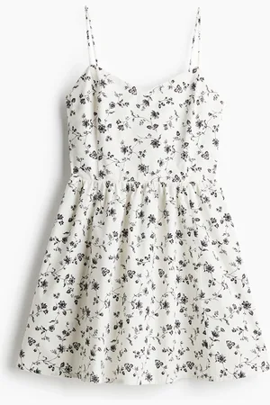 H&M Alaosasta levenevä puuvillamekko
