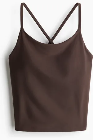 H&M Kiinteäliivinen tankinitreenitoppi