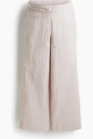 H&M MAMA Väljät musliinihousut