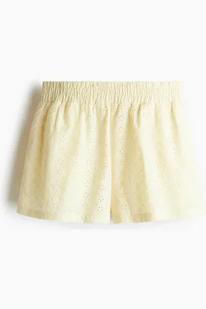 H&M Korkeavyötäröiset broderie anglaise -shortsit