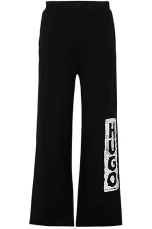 HUGO BOSS Naiset Housut - Cotton-terry tracksuit bottoms with vertical logo