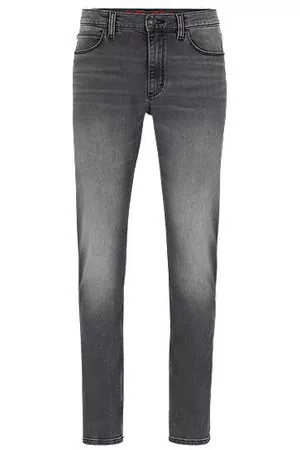 HUGO BOSS Miehet Slim Fit Farkut - Extra-slim-fit jeans in silver-wash stretch denim