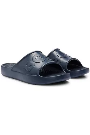 HUGO BOSS Miehet Varvassandaalit - Lightweight EVA slides with logo strap