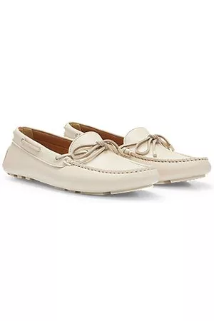 HUGO BOSS Naiset Loaferit - Driver moccasins in leather with bow detail