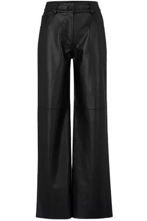 HUGO BOSS Naiset Nahkahousut - Logo-embossed relaxed-fit trousers in faux leather