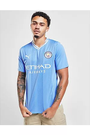 PUMA Miehet T-paidat - Manchester City FC 2023/24 Home Shirt - Mens