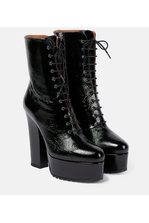 Alaïa AlaÃ¯a Leather platform ankle boots