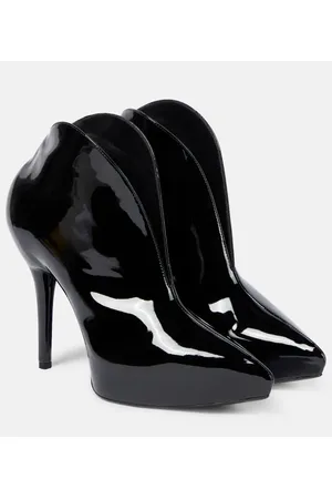 Alaïa AlaÃ¯a Booties Slick patent leather ankle boots