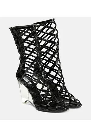 Alaïa AlaÃ¯a Leather wedge ankle boots