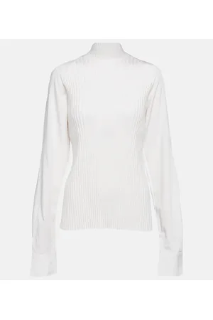 Totême Ribbed-knit turtleneck wool-blend top