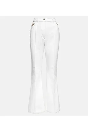 Patou Embellished high-rise flared jeans