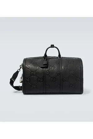 Gucci GG embossed leather duffle bag