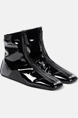 Alaïa AlaÃ¯a Sneaker faux patent leather ankle boots