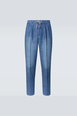 Brunello Cucinelli Faded tapered jeans