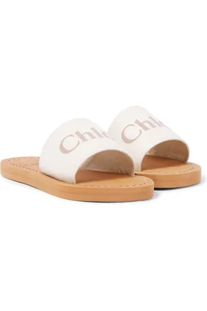 Chloé ChloÃ© Kids Logo embossed denim slides