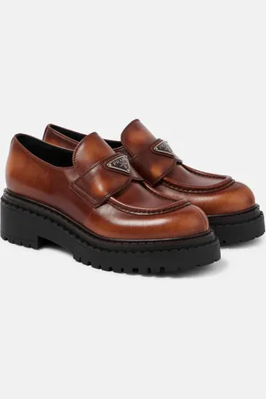 Prada Logo leather platform loafers