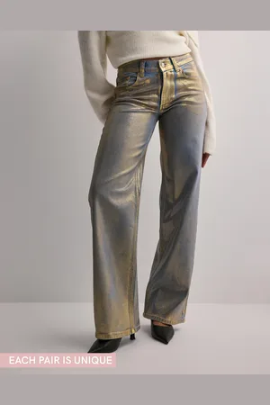 Nelly - Loose Golden Jeans